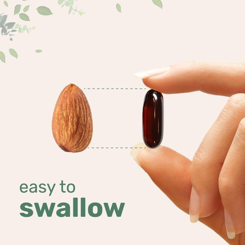 Hand holding a dark red capsule next to an almond with text 'easy to swallow' on a light green background.